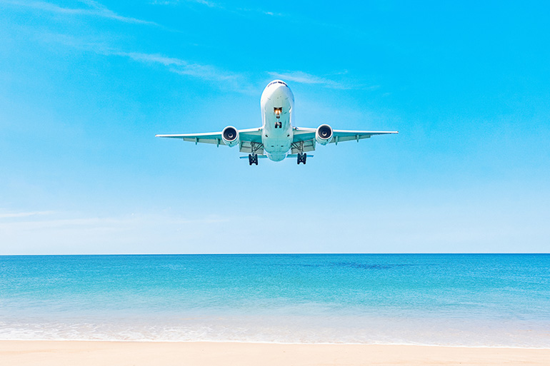 airplane-land-over-beach.jpg